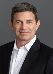 David Rapallo, a man with dark hair wearing a black sport jacket and white shirt.