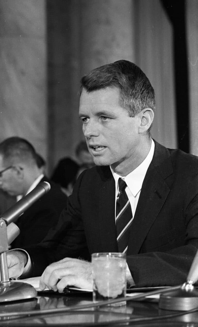 Image of Robert F Kennedy speaking into a microphone